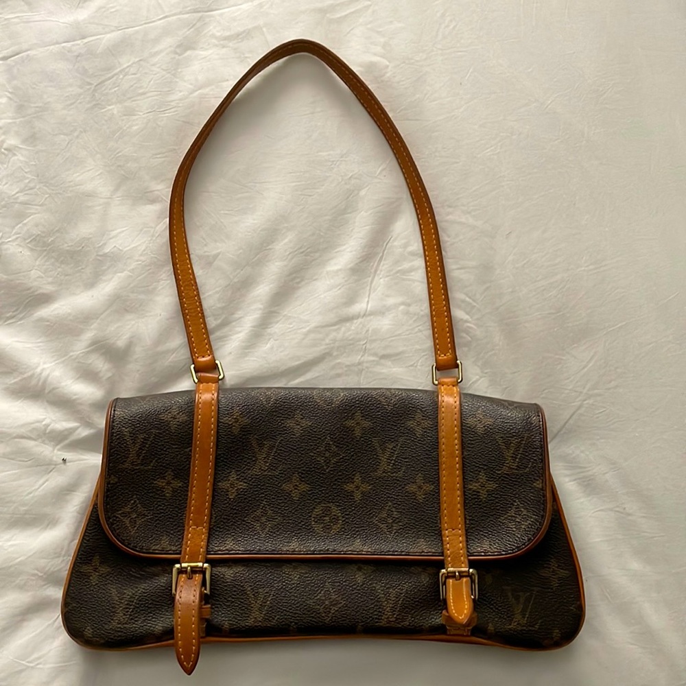 Purchased at LV in Paris with limited release in NA.  Good condition